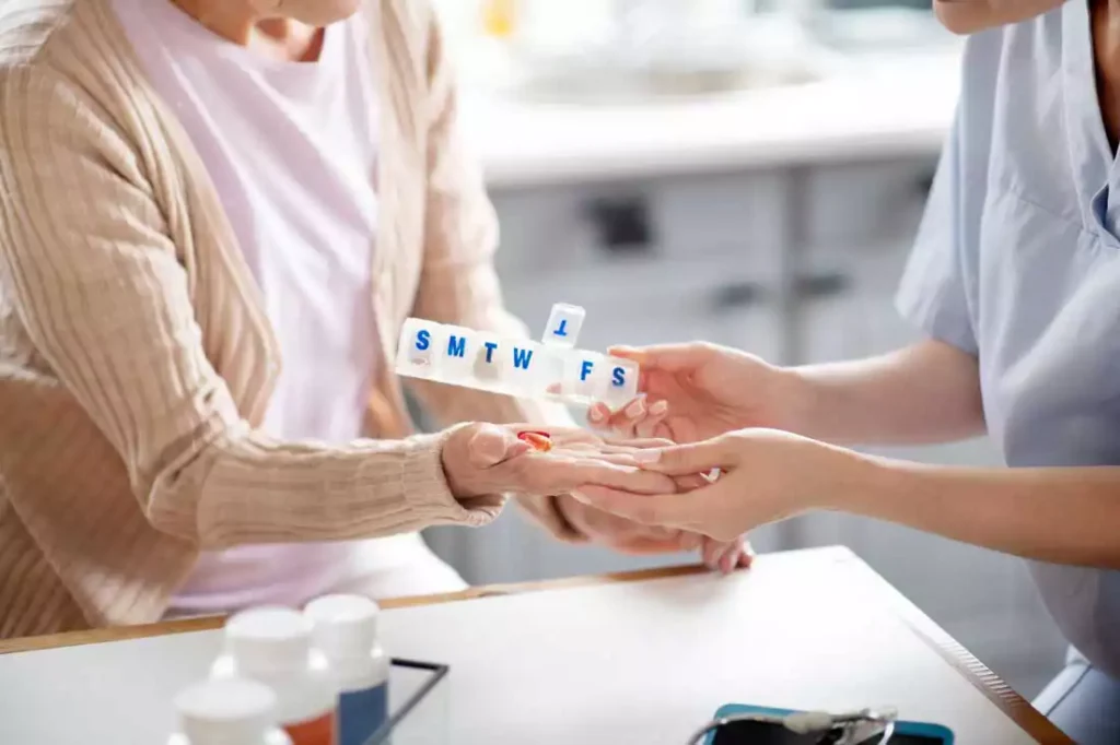 Audubon Care Homes senior taking medication