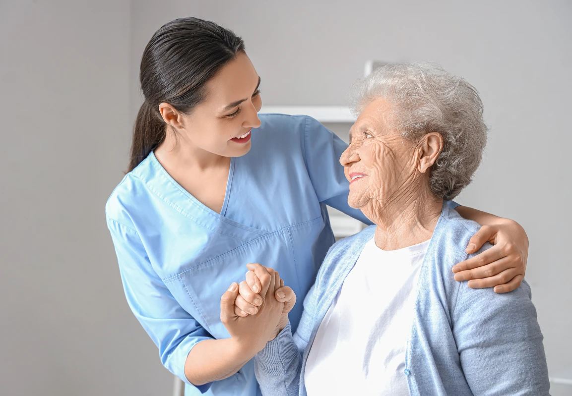 Audubon Care Homes senior lady and caregiver