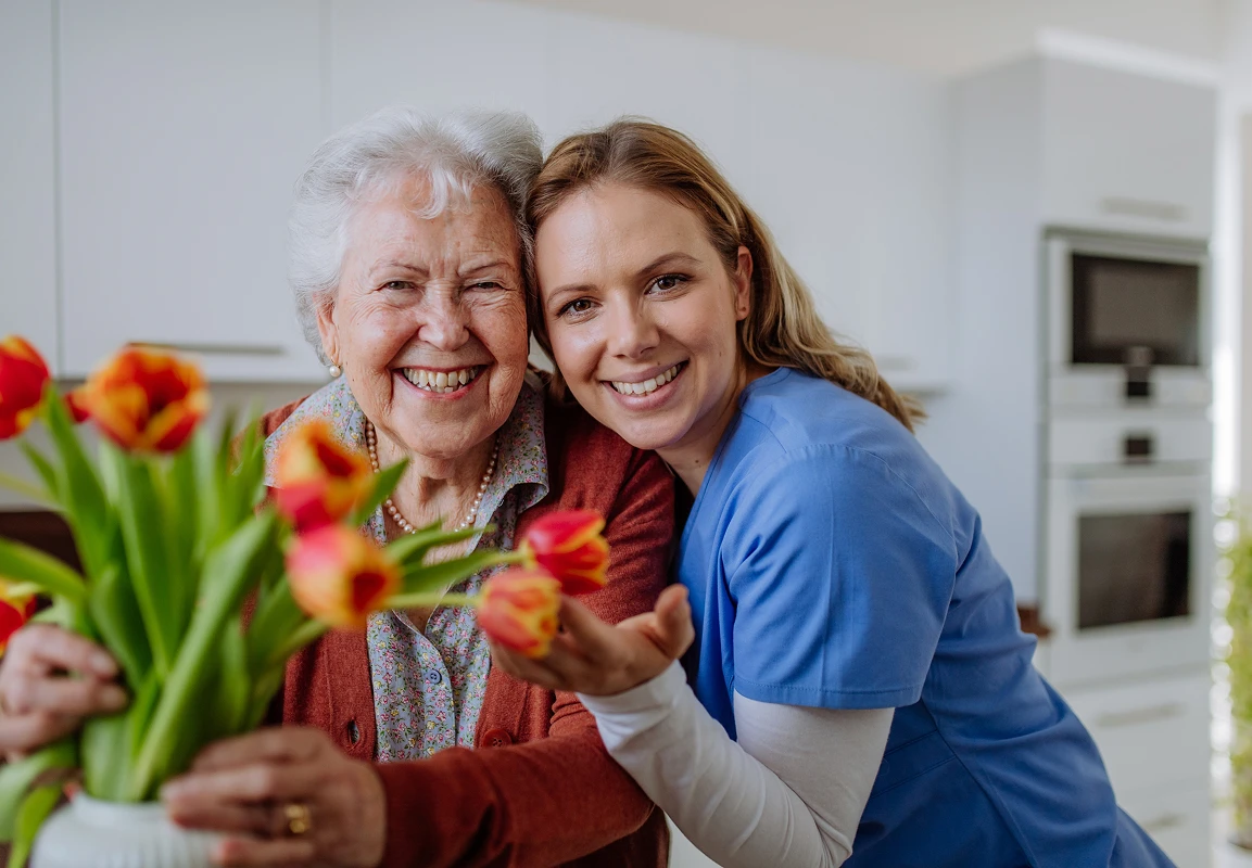 Audubon Care Homes caregiver and senior lady